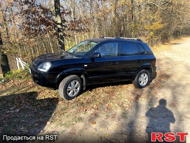 Чорний Хендай Туксон, об'ємом двигуна 2 л та пробігом 182 тис. км за 8700 $, фото 2 на Automoto.ua