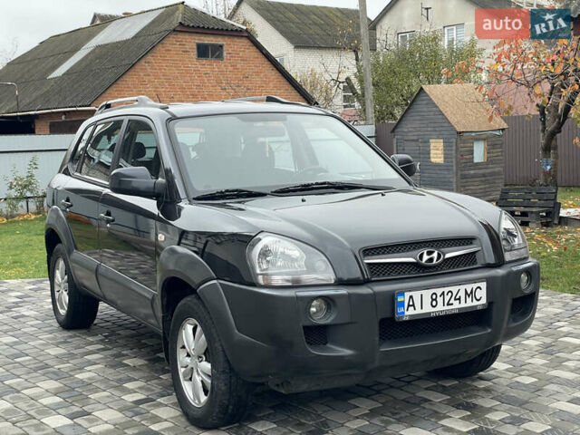 Чорний Хендай Туксон, об'ємом двигуна 2 л та пробігом 200 тис. км за 8450 $, фото 2 на Automoto.ua
