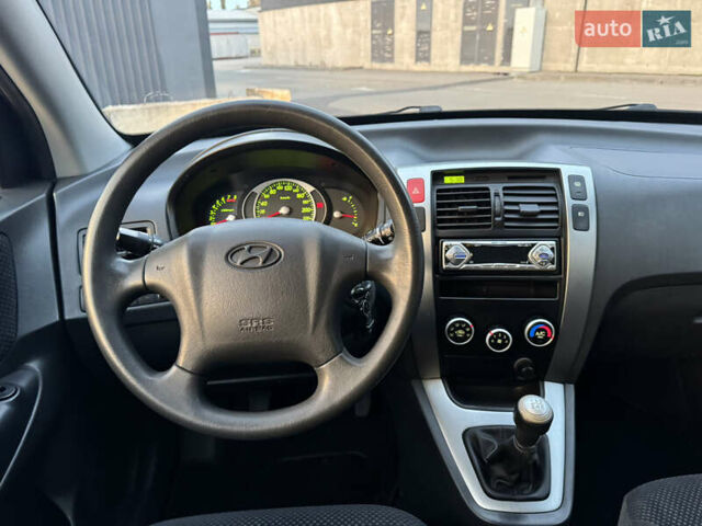 Хендай Туксон 2009 в Киеве на Automoto.ua Черный Хендай Туксон, объемом двигателя 2 л и пробегом 110 тыс. км за 8700 $, фото 31 на Automoto.ua