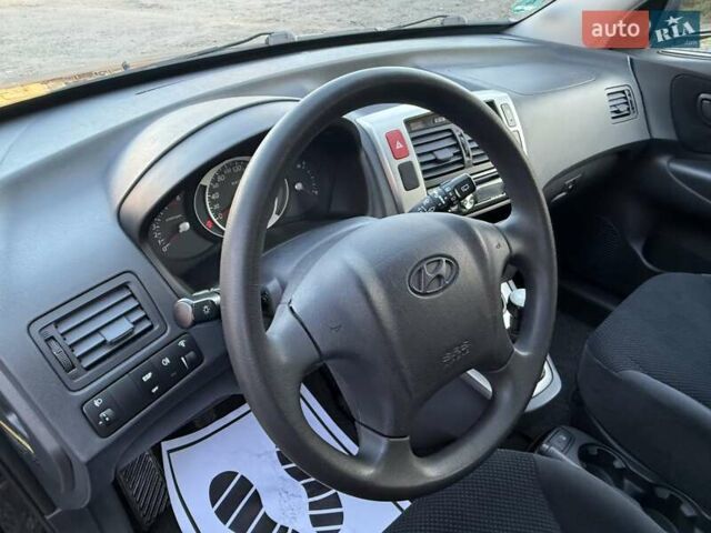Черный Хендай Туксон, объемом двигателя 2 л и пробегом 110 тыс. км за 8899 $, фото 14 на Automoto.ua