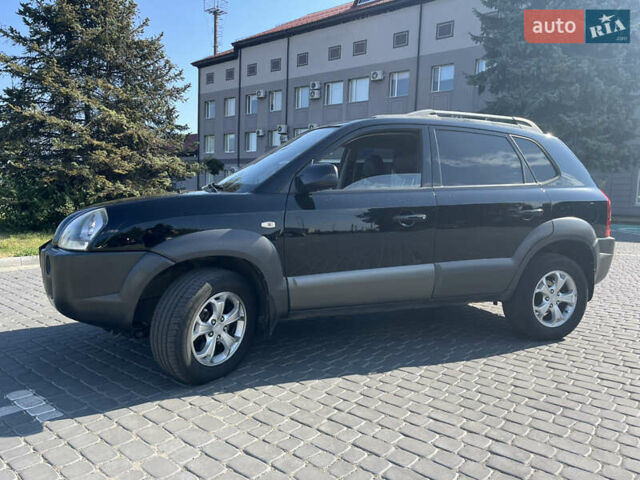 Черный Хендай Туксон, объемом двигателя 2 л и пробегом 137 тыс. км за 8800 $, фото 1 на Automoto.ua