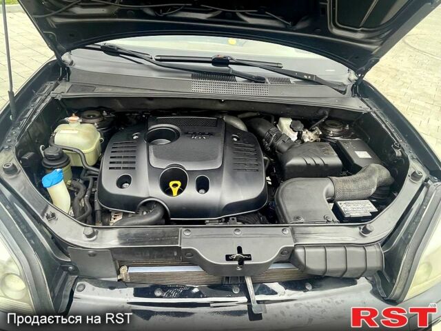 Черный Хендай Туксон, объемом двигателя 2 л и пробегом 168 тыс. км за 7700 $, фото 8 на Automoto.ua