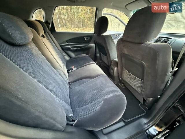 Черный Хендай Туксон, объемом двигателя 2 л и пробегом 148 тыс. км за 8700 $, фото 19 на Automoto.ua