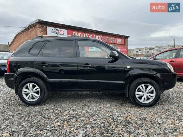 Чорний Хендай Туксон, об'ємом двигуна 2 л та пробігом 166 тис. км за 7500 $, фото 5 на Automoto.ua