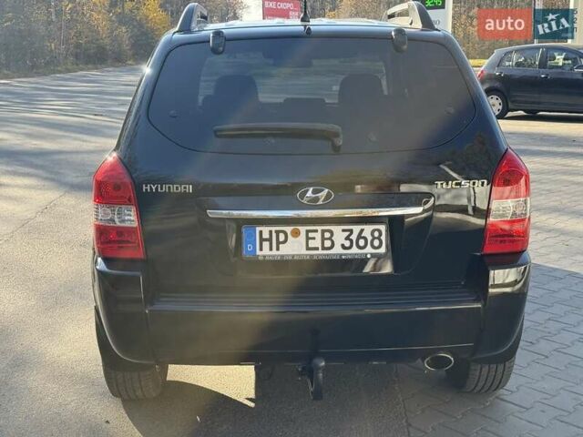 Черный Хендай Туксон, объемом двигателя 2 л и пробегом 148 тыс. км за 8700 $, фото 37 на Automoto.ua