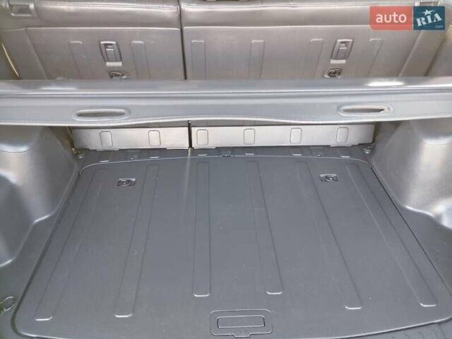 Черный Хендай Туксон, объемом двигателя 1.99 л и пробегом 159 тыс. км за 9700 $, фото 5 на Automoto.ua