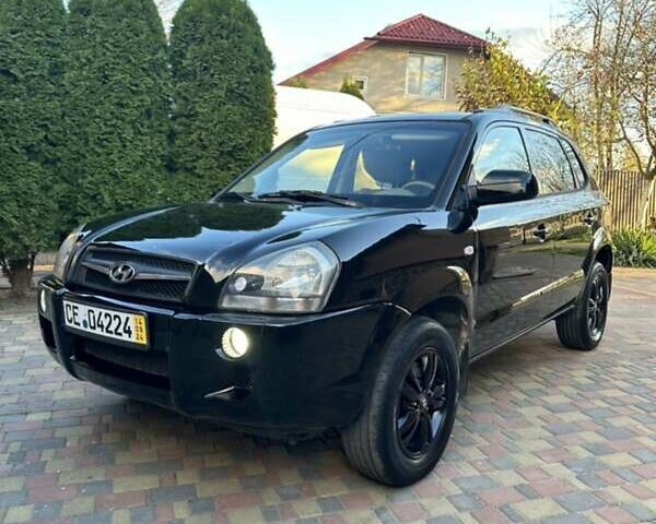 Черный Хендай Туксон, объемом двигателя 1.98 л и пробегом 198 тыс. км за 8250 $, фото 10 на Automoto.ua