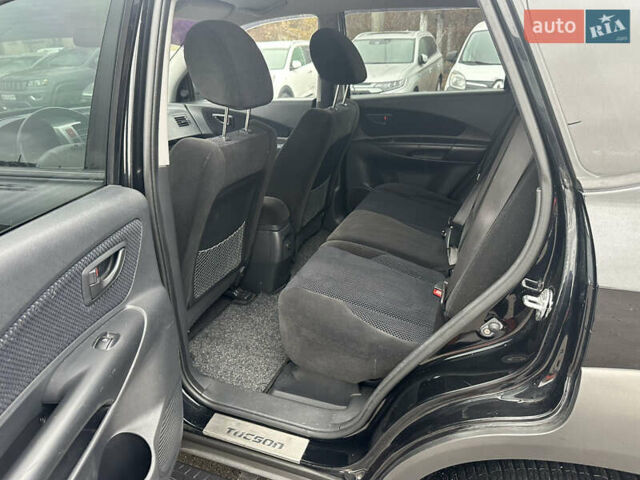 Чорний Хендай Туксон, об'ємом двигуна 1.98 л та пробігом 230 тис. км за 8700 $, фото 12 на Automoto.ua