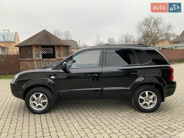 Черный Хендай Туксон, объемом двигателя 2 л и пробегом 114 тыс. км за 8850 $, фото 12 на Automoto.ua