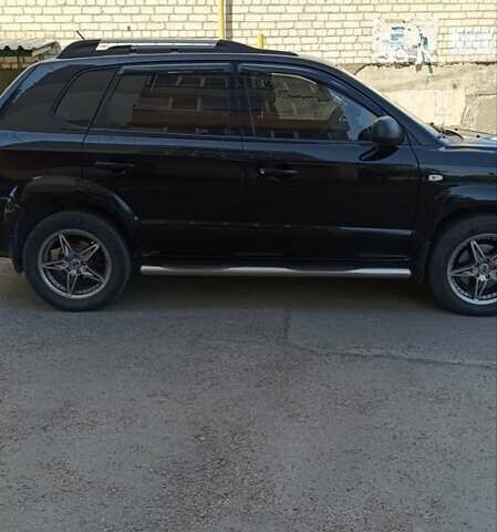 Черный Хендай Туксон, объемом двигателя 2 л и пробегом 226 тыс. км за 8700 $, фото 5 на Automoto.ua