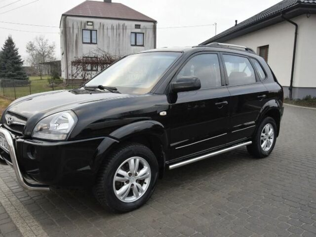 Черный Хендай Туксон, объемом двигателя 2 л и пробегом 184 тыс. км за 5480 $, фото 4 на Automoto.ua