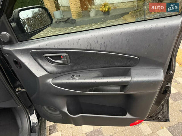 Черный Хендай Туксон, объемом двигателя 2.66 л и пробегом 205 тыс. км за 10000 $, фото 71 на Automoto.ua