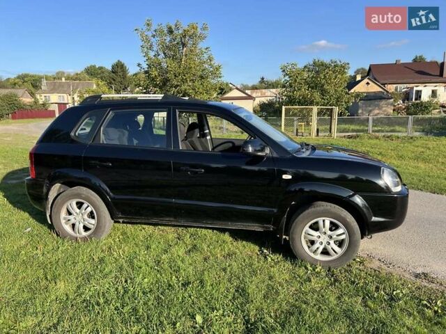Черный Хендай Туксон, объемом двигателя 2 л и пробегом 199 тыс. км за 8300 $, фото 20 на Automoto.ua