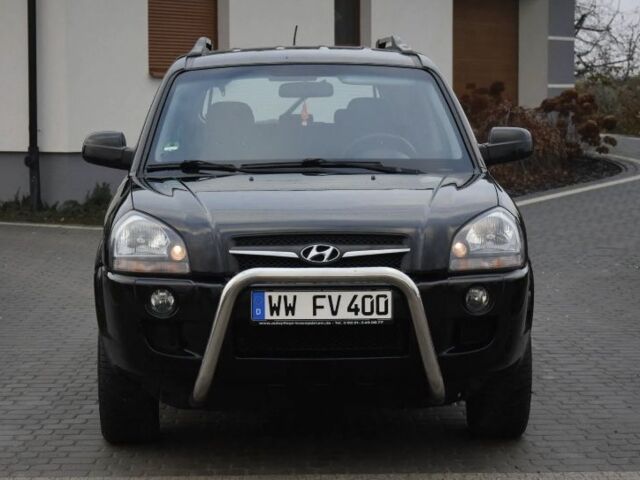 Черный Хендай Туксон, объемом двигателя 2 л и пробегом 184 тыс. км за 5480 $, фото 5 на Automoto.ua