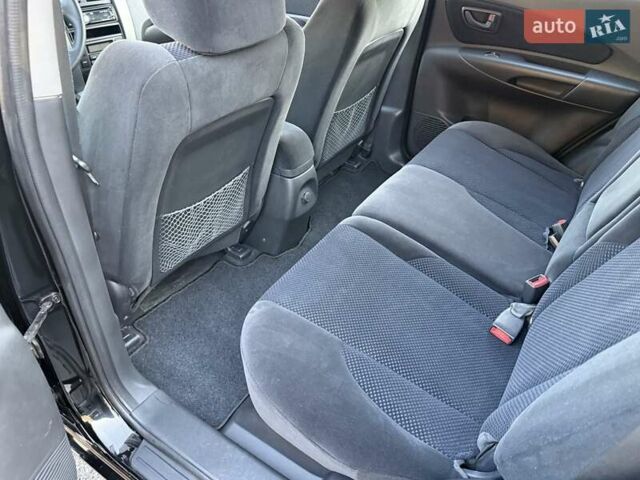 Черный Хендай Туксон, объемом двигателя 2 л и пробегом 110 тыс. км за 8899 $, фото 22 на Automoto.ua
