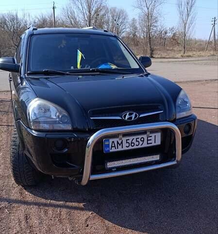 Черный Хендай Туксон, объемом двигателя 2 л и пробегом 226 тыс. км за 8700 $, фото 23 на Automoto.ua