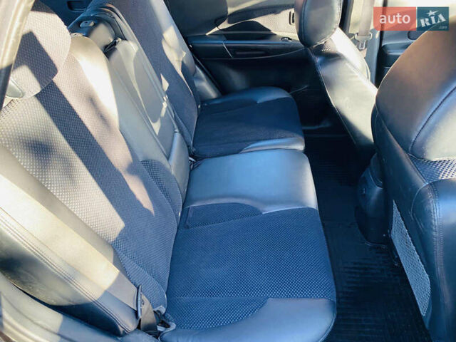 Черный Хендай Туксон, объемом двигателя 1.99 л и пробегом 95 тыс. км за 8500 $, фото 18 на Automoto.ua