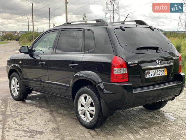 Черный Хендай Туксон, объемом двигателя 2 л и пробегом 191 тыс. км за 7800 $, фото 5 на Automoto.ua