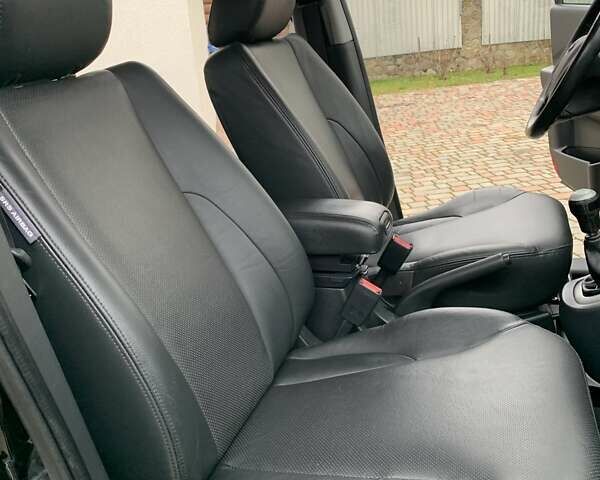 Черный Хендай Туксон, объемом двигателя 2 л и пробегом 114 тыс. км за 8850 $, фото 54 на Automoto.ua