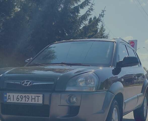 Чорний Хендай Туксон, об'ємом двигуна 1.99 л та пробігом 286 тис. км за 9499 $, фото 5 на Automoto.ua