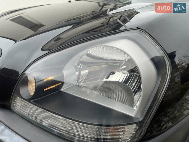 Чорний Хендай Туксон, об'ємом двигуна 2 л та пробігом 200 тис. км за 8450 $, фото 16 на Automoto.ua