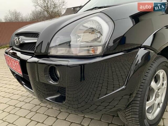 Черный Хендай Туксон, объемом двигателя 2 л и пробегом 114 тыс. км за 8850 $, фото 13 на Automoto.ua