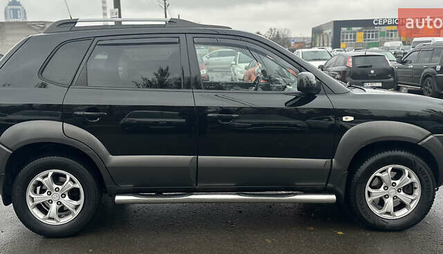 Чорний Хендай Туксон, об'ємом двигуна 1.98 л та пробігом 230 тис. км за 8700 $, фото 6 на Automoto.ua