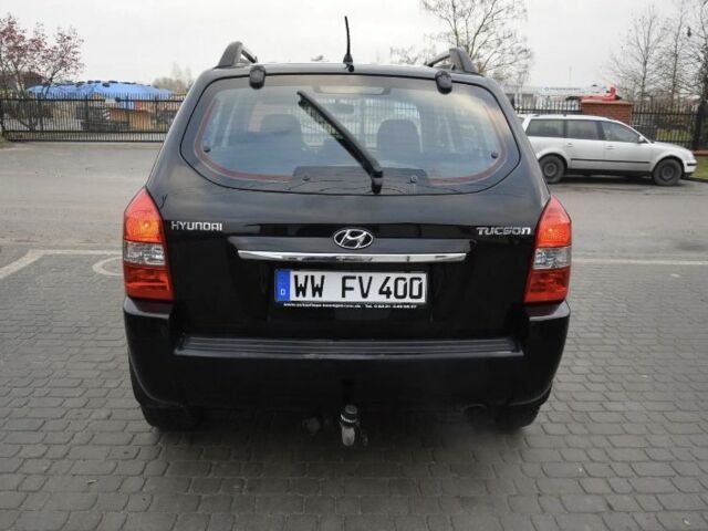 Черный Хендай Туксон, объемом двигателя 2 л и пробегом 184 тыс. км за 5480 $, фото 11 на Automoto.ua