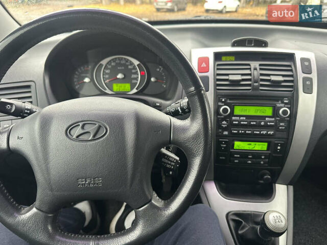 Чорний Хендай Туксон, об'ємом двигуна 1.98 л та пробігом 230 тис. км за 8700 $, фото 19 на Automoto.ua