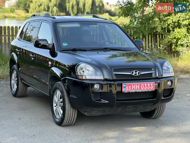 Черный Хендай Туксон, объемом двигателя 2 л и пробегом 243 тыс. км за 8000 $, фото 23 на Automoto.ua