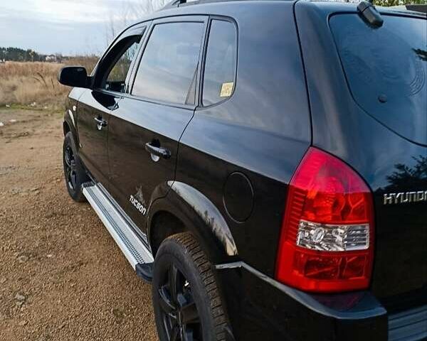 Чорний Хендай Туксон, об'ємом двигуна 1.98 л та пробігом 172 тис. км за 9500 $, фото 3 на Automoto.ua
