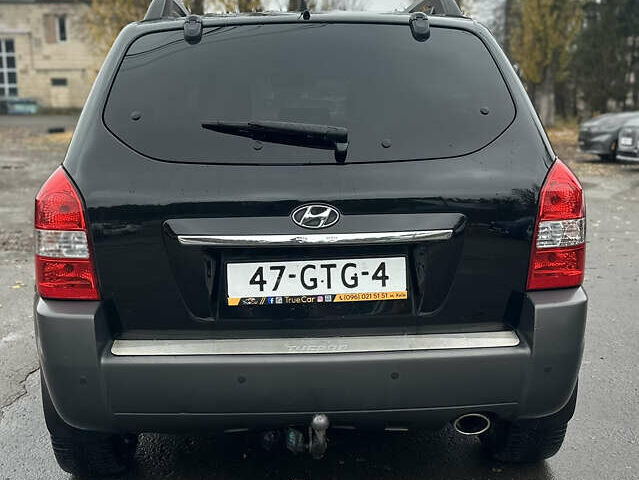 Чорний Хендай Туксон, об'ємом двигуна 1.98 л та пробігом 230 тис. км за 8700 $, фото 4 на Automoto.ua