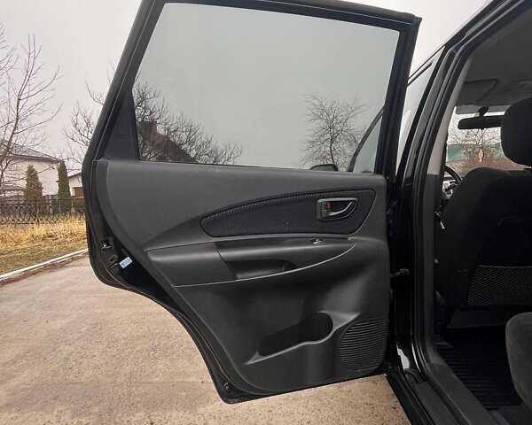 Черный Хендай Туксон, объемом двигателя 2 л и пробегом 128 тыс. км за 9200 $, фото 14 на Automoto.ua