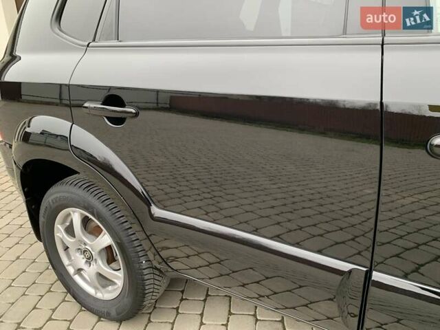 Черный Хендай Туксон, объемом двигателя 2 л и пробегом 114 тыс. км за 8850 $, фото 18 на Automoto.ua