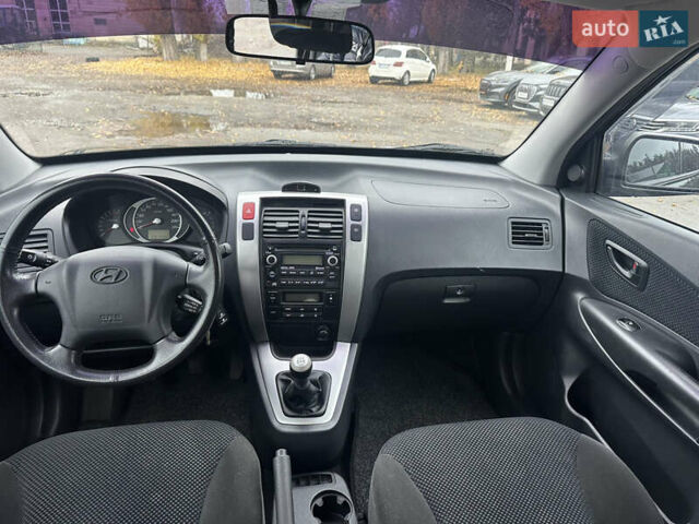 Чорний Хендай Туксон, об'ємом двигуна 1.98 л та пробігом 230 тис. км за 8700 $, фото 13 на Automoto.ua