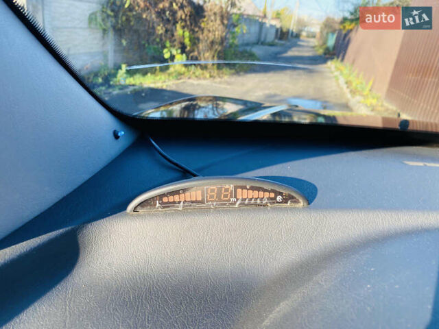 Черный Хендай Туксон, объемом двигателя 1.99 л и пробегом 95 тыс. км за 8500 $, фото 29 на Automoto.ua