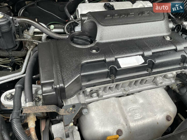 Чорний Хендай Туксон, об'ємом двигуна 2 л та пробігом 200 тис. км за 8450 $, фото 41 на Automoto.ua