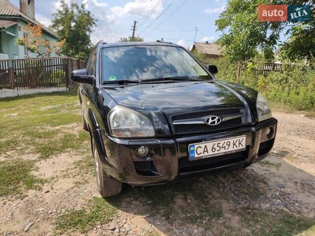 Чорний Хендай Туксон, об'ємом двигуна 1.98 л та пробігом 145 тис. км за 10000 $, фото 1 на Automoto.ua