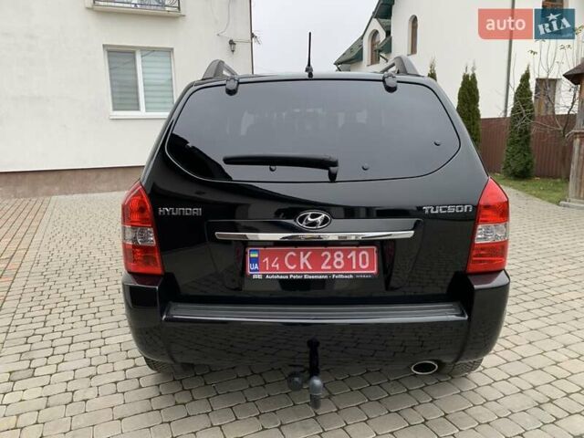 Черный Хендай Туксон, объемом двигателя 2 л и пробегом 114 тыс. км за 8850 $, фото 10 на Automoto.ua