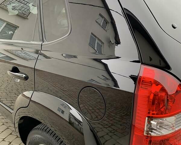 Черный Хендай Туксон, объемом двигателя 2 л и пробегом 114 тыс. км за 8850 $, фото 22 на Automoto.ua