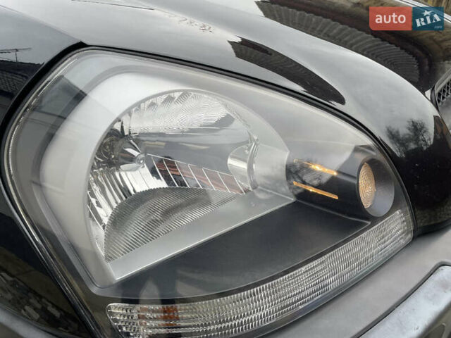 Чорний Хендай Туксон, об'ємом двигуна 2 л та пробігом 200 тис. км за 8450 $, фото 21 на Automoto.ua