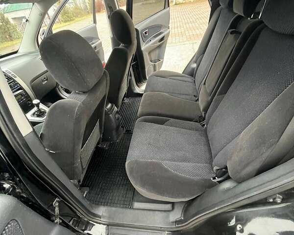 Черный Хендай Туксон, объемом двигателя 2 л и пробегом 128 тыс. км за 9200 $, фото 11 на Automoto.ua