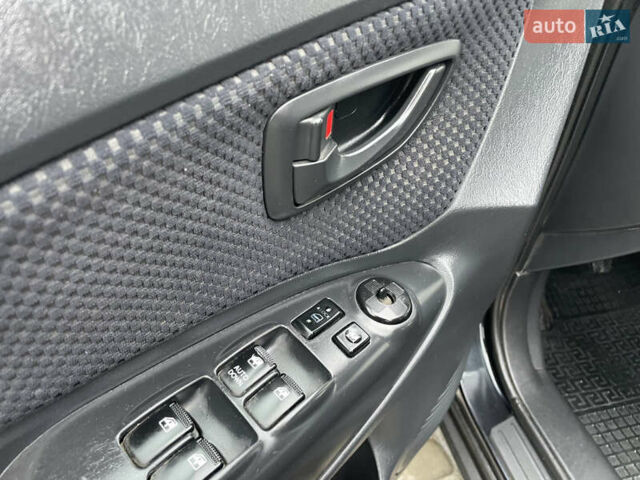 Чорний Хендай Туксон, об'ємом двигуна 2 л та пробігом 200 тис. км за 8450 $, фото 25 на Automoto.ua