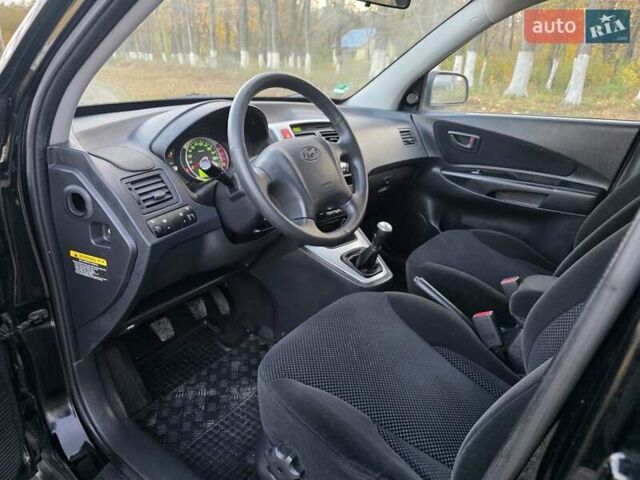 Хендай Туксон 2009 в Гусятине на Automoto.ua Черный Хендай Туксон, объемом двигателя 2 л и пробегом 143 тыс. км за 9700 $, фото 29 на Automoto.ua
