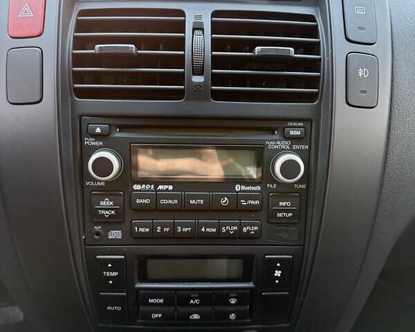 Черный Хендай Туксон, объемом двигателя 2 л и пробегом 148 тыс. км за 8700 $, фото 27 на Automoto.ua