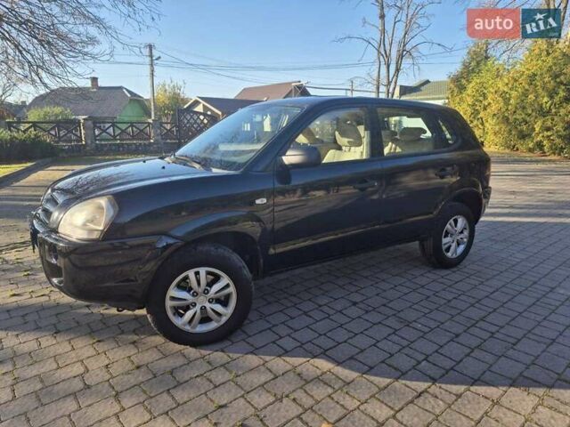 Чорний Хендай Туксон, об'ємом двигуна 2 л та пробігом 187 тис. км за 7900 $, фото 1 на Automoto.ua