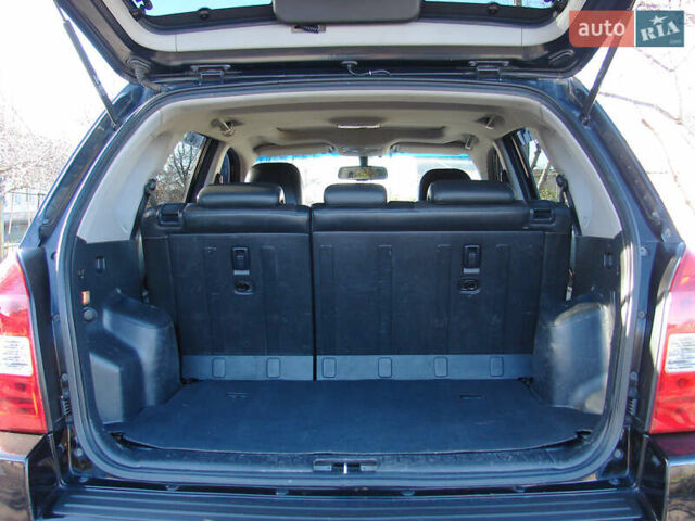 Черный Хендай Туксон, объемом двигателя 2 л и пробегом 162 тыс. км за 8200 $, фото 25 на Automoto.ua