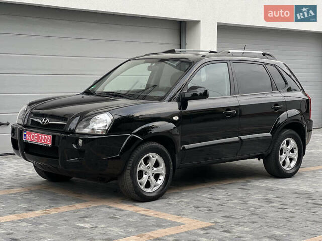 Чорний Хендай Туксон, об'ємом двигуна 2 л та пробігом 163 тис. км за 9199 $, фото 14 на Automoto.ua
