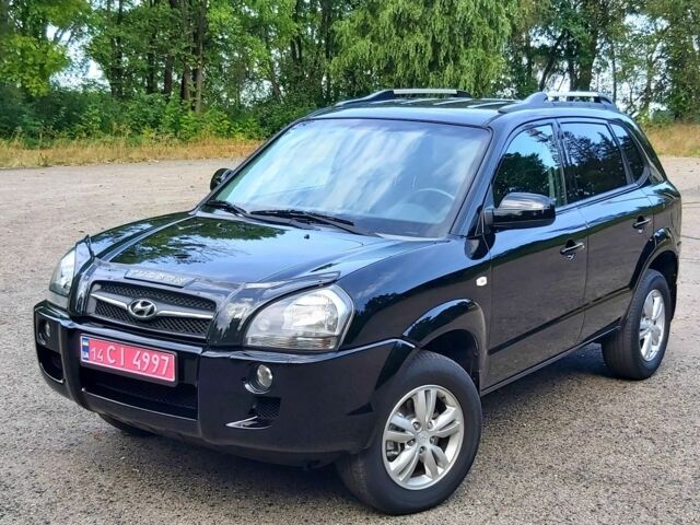 Черный Хендай Туксон, объемом двигателя 2 л и пробегом 205 тыс. км за 7999 $, фото 1 на Automoto.ua