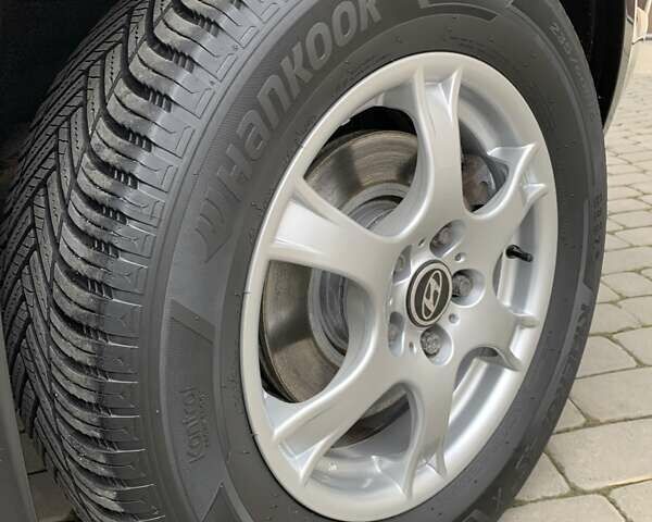 Черный Хендай Туксон, объемом двигателя 2 л и пробегом 114 тыс. км за 8850 $, фото 75 на Automoto.ua